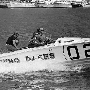 Princess Anne driving a speed boat called Who Dares around Monte Carlo Bay alongside