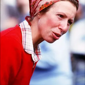 Princess Anne wearing red headscarf