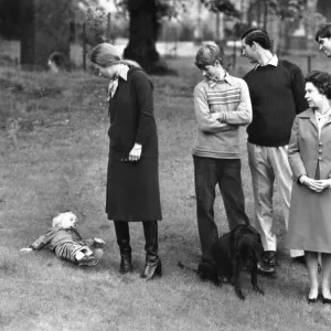 Queen Elizabeth II takes a stroll in the grounds of Balmoral Castle with Prince Philip