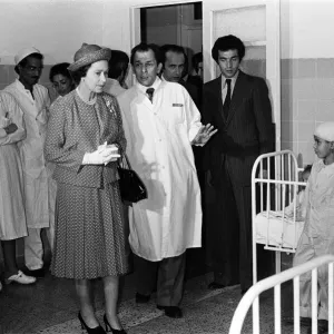 Queen Elizabeth II visits the victims of El Asnam earthquake in hospital in Algiers