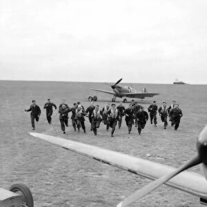 RAF Pilots scramble during th Battle of Britain Conflict World War Two Pilots
