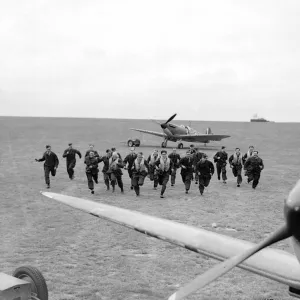 RAF Pilots scramble during th Battle of Britain Conflict World War Two Pilots