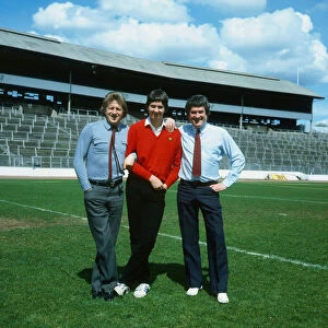 Former Rangers football player Jim Baxter (right) with his son (centre