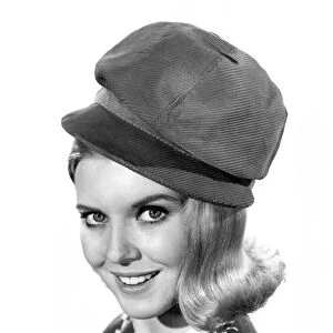 Reveille Fashions: Maureen Walker. modeling a corduroy hat August 1964 P007600
