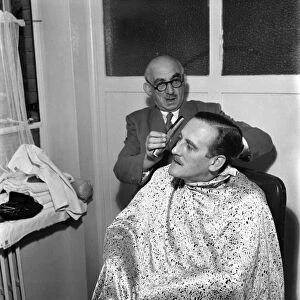 Rex North has haircut by Charles Topper gentleman Barbar. June 1952 C2951