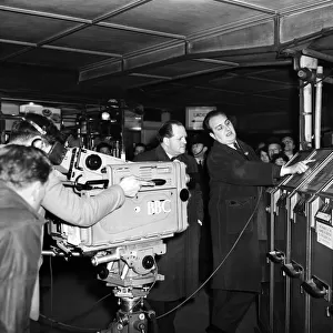 Richard Dimbleby filming for French television at Victoria Station. 9th March 1956