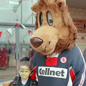 Roary the Boro mascot and a fan at Middlesbrough Football Club