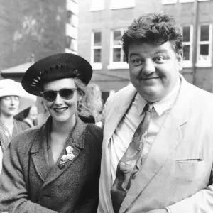 Robbie Coltrane actor arriving with unknown lady for the wedding of Nigel Planer