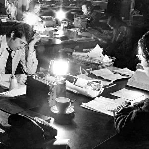 The scene in The Journal newsroom during one of the power cuts in 1972