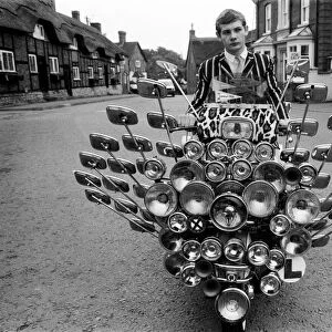 School leaver Bryn Owen aged 17 with his Vespa scooter, which has 34 mirrors