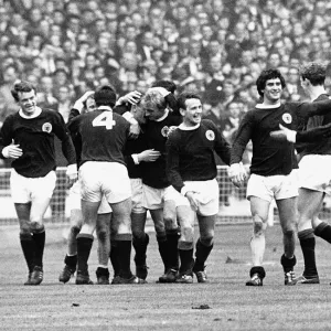 Scotland football team celebrate scoring goal in victory over England at Wembley, 1967