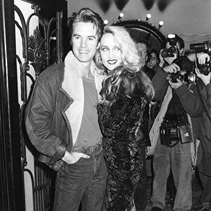 Shaun Cassidy Actor and Jerry Hall supermodel stand inside the Lyric Theatre in London
