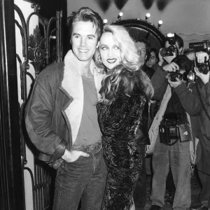 Shaun Cassidy Actor and Jerry Hall supermodel stand inside the Lyric Theatre in London