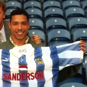 Sheffield Wednesday footballer Des Walker with manager Trevor Francis after signing for