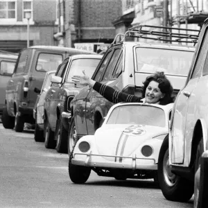 Sian Lloyd, who works at Walt Disney Productions, driving a replica of Herbie in Primrose