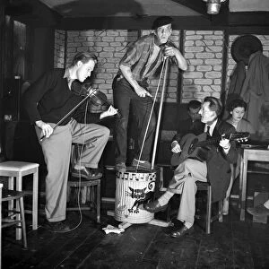 Skiffle group belived to be called the Black Cat seen here performing in a pub