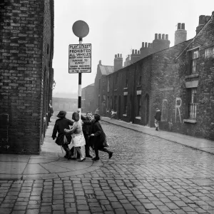 Slum housing in Salford. 3rd April 1960