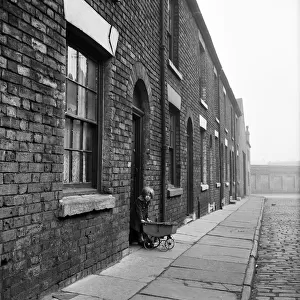 Slum living conditions in Salford. 3rd April 1960