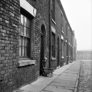 Slum living conditions in Salford. 3rd April 1960