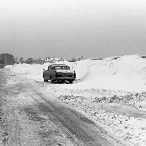 A snowy road next to Coventry airport, Baginton, Coventry. 3rd January 1963