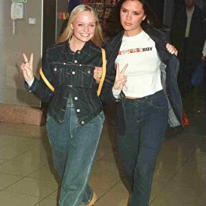 Spice Girls Emma and Victoria leave Heathrow for Los Angeles