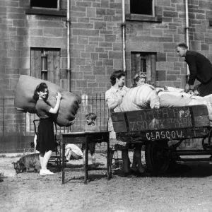 Squatters moving into derelict housing in Barlinnie, Glasgow, August 1946