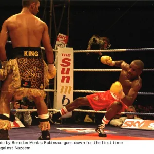 Steve Robinson hits the canvas floored by Prince Naseem Hamed during WBO featherweight