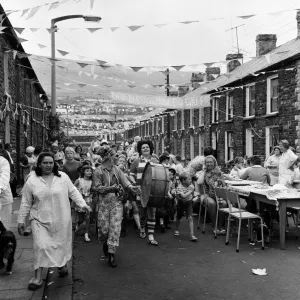 A street party to celebrate the Investiture of Prince Charles at Caernarfon Castle. Wales