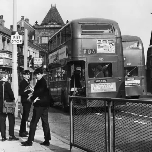 Students of Liverpool University waiting at the bus stop on the Smithdown Road