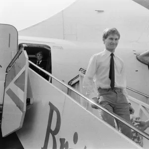 Sub Lieutenant Ian "Soapy"Watson arrives at Gatwick airport