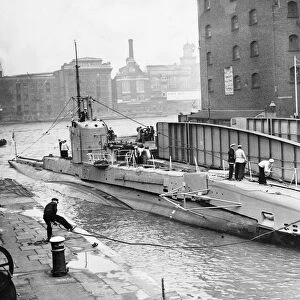 The Submarine Swordfish entering St Catherines Dock from The River Thames
