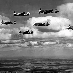 Supermarine Spitfire F22 s, of RAF Ouston, in flight rehearsing for the 10th