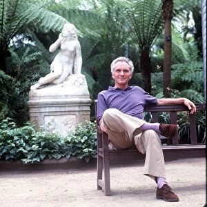 Terence Stamp sitting on a bench - July 1987