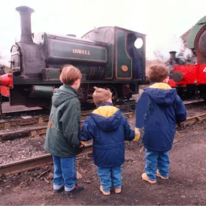 Thee little ones study steam locomotives at the Tanfield Railway engine sheds which were