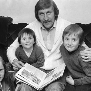 Tommy Hutchison relaxes at home with his children Lynn (9), David (3) and John (6)