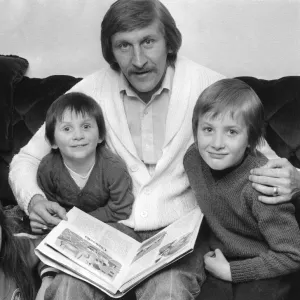 Tommy Hutchison relaxes at home with his children Lynn (9), David (3) and John (6)