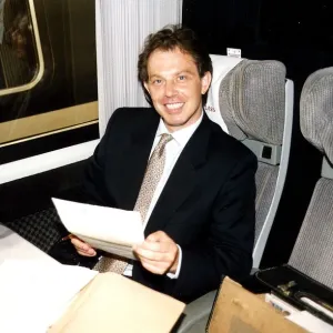 Tony Blair leader of the Labour Party onboard a train. July 1994