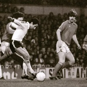 Tottenhams Ossie Ardiles beats the Altrincham defence during their FA Cup 3rd round game