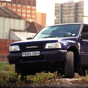 VAUXHALL FRONTERA SPORTs parked on rough ground dark blue