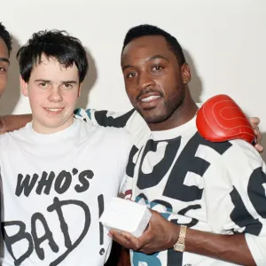 Former WBO middleweight champion Nigel Benn (right) with cousin Paul Ince (left