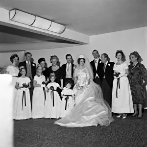 The wedding of Edwina Sandys and Piers Dixon. Standing to the left of Piers Dixon is Lady