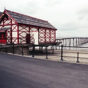 A young boy skateboarding past Saltburn pier, North Yorkshire. 9th May 1996