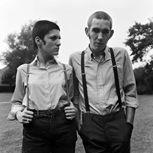 Two young people wearing skinhead fashions. Glenda Peake and Tony Hughes
