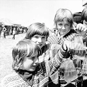Four youngster display their prize goldfish in 1975 at the Hoppings on Newcastle