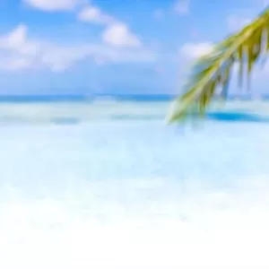 Background of summer sand and blurred landscape of beach. Free space for your decoration over paradise island beach