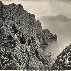 View of the Mitramonia grotto, with its natural arch, on the island of Capri