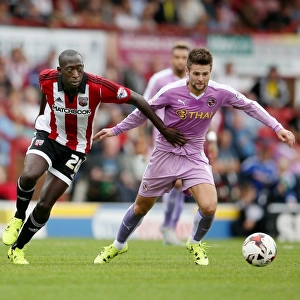 Norwood vs. Diagouraga: A Championship Showdown at Griffin Park - Brentford's Clash with Reading