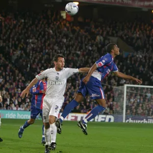 Paul Reid goes up for a header