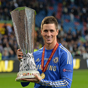 Chelsea's Europa League Triumph: Fernando Torres Lifts the Trophy at Amsterdam Arena (May 16, 2013)
