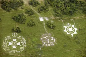 Prints of Chalk Military Badges of the Post Office Rifles, the Devonshire Regiment and also the Centenary Poppy Badge under construction, Part of the Fovant Badges, Fovant Down, Wiltshire, 2016 Sculpture Prints: Fovant Badges Print, Wiltshire Landscape